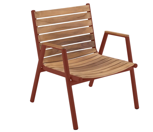 Red Ochre Fermob Pilotis teak outdoor armchair with low armrest, showcasing solid teak construction and modern design.
