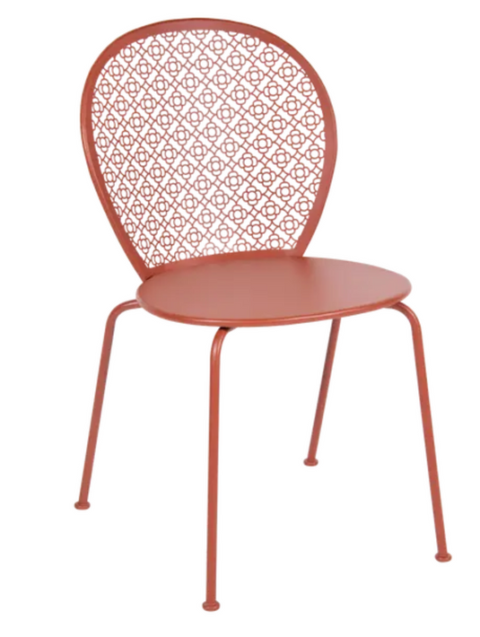 Red Ochre Fermob Lorette metal outdoor chair with a colorful finish, designed for stylish outdoor seating.