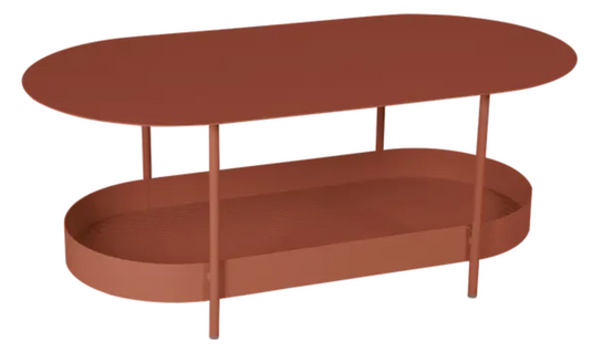 Red Ochre Salsa low table by Fermob, measuring 113 x 58cm, showcasing its sleek, modern design on a clean background.