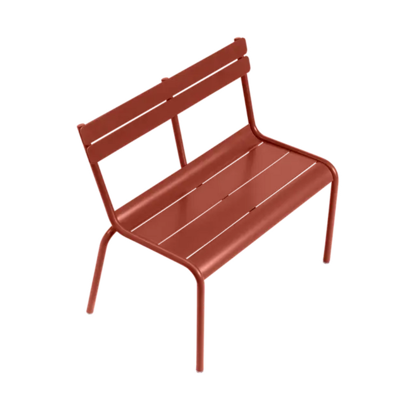 Load image into Gallery viewer, Red Luxembourg Kid Bench by Fermob, a colorful small corner contract bench for kids' dining or play areas.
