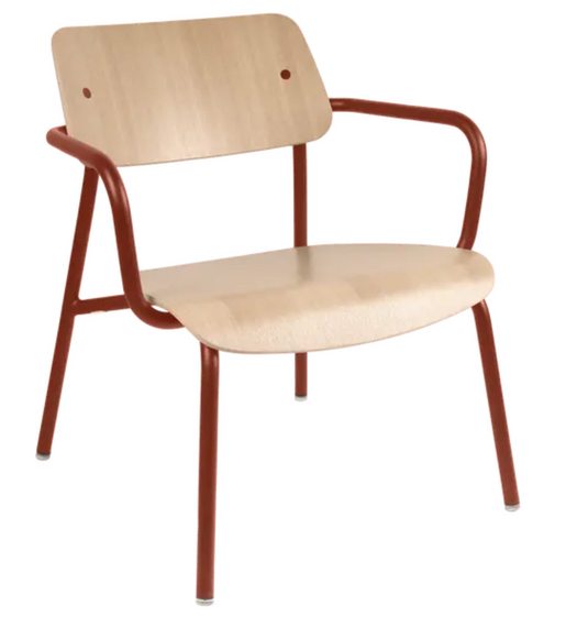 Red Ochre Fermob Studie Oak Lounge Armchair with metal frame, showcasing a stylish, modern office furniture design.