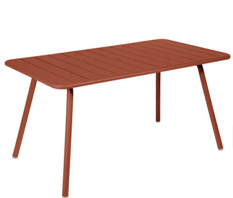 Load image into Gallery viewer, Red ochre Fermob Luxembourg outdoor bar table, 143x80 cm, with a sleek design, suitable for patio or outdoor use.
