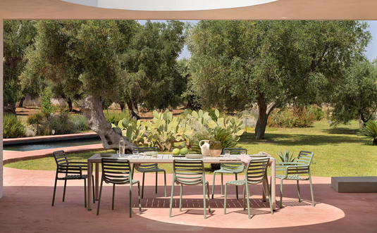 Nardi Tevere 210 extendable outdoor table with a sleek design, ideal for garden or patio dining, shown in a modern outdoor setting.