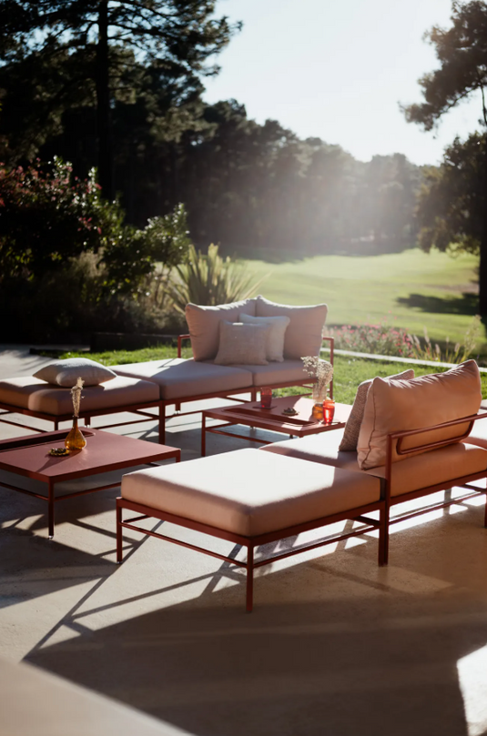 Fermob Rivage Ottoman outdoor furniture with metal frame and fabric cover, designed for stylish patio or garden seating.