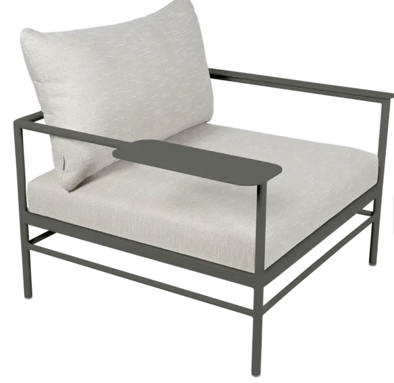 Load image into Gallery viewer, Fermob Rivage low armchair with metal frame and woven wicker seat, outdoor garden furniture for relaxing in the garden.

