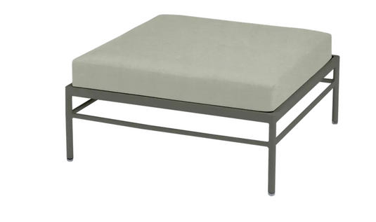 Rosemary Meadow green Fermob Rivage outdoor ottoman with metal frame, versatile lounge footstool for garden or patio.