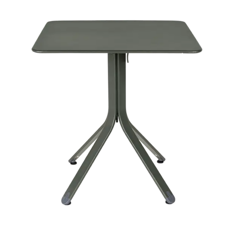 Load image into Gallery viewer, Fermob Rest'O folding outdoor table in metal with 71x71cm rosemary finish, shown folded with tabletop and legs visible.
