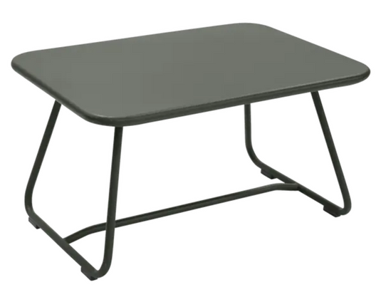 Fermob Rosemary Sixties low outdoor table, 76x55.5cm, featuring a stylish, modern design for patio or garden use.