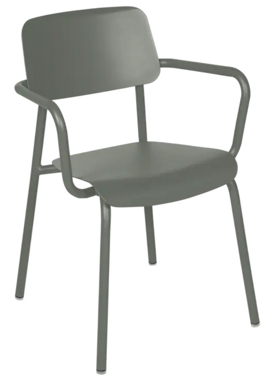 Fermob Study Armchair, a stackable indoor dining and office chair with a sleek design, suitable for home and office environments.