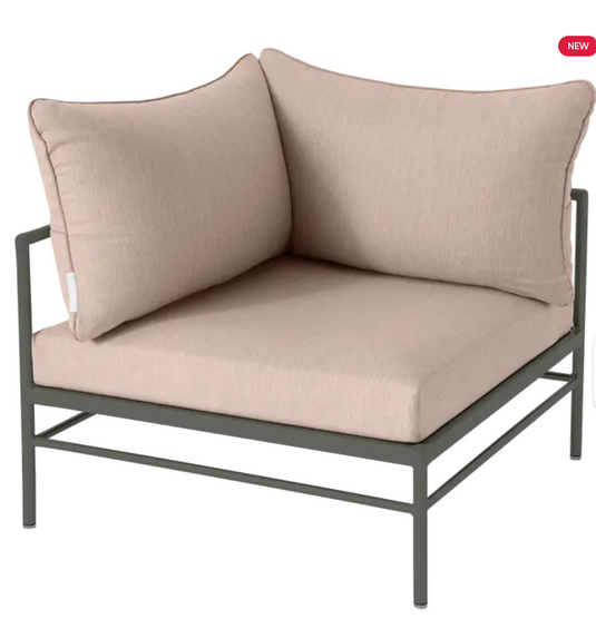 Fermob Rivage corner outdoor armchair with metal frame and woven fabric, designed for comfortable outdoor lounging.