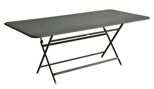 Fermob Caractère foldable outdoor table in rosemary color, 190x90cm, seating eight, suitable for outdoor dining and gatherings.