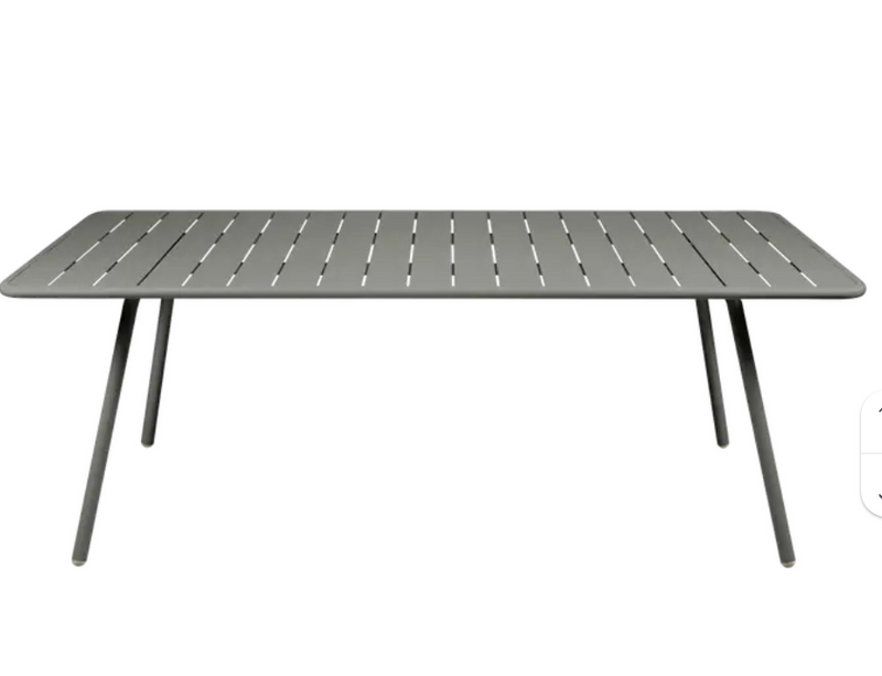 Load image into Gallery viewer, Fermob Luxembourg outdoor table, 207x100 cm, with a sleek design and smooth surface, suitable for patio or garden seating.
