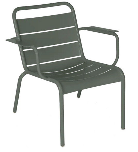 Rosemary white Fermob Luxembourg garden lounge armchair with a modern, curved design for outdoor relaxation.