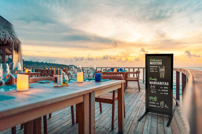 Load image into Gallery viewer, Securit Chalkboard Set - Woody Large Pavement Stand in Black 120 cm - Board + Waterproof Markers + Cleaner - in use
