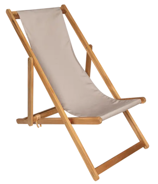 Fermob Ibiza teak deck chair with a natural wooden finish, designed for outdoor lounging on a patio or garden.