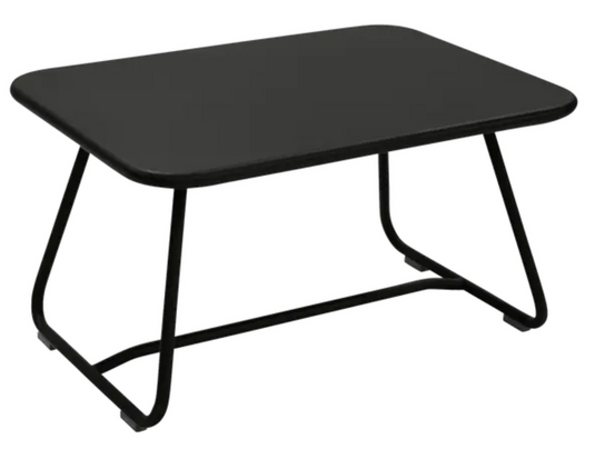 Fermob Sixties low outdoor table with 76 x 55.5cm round top, modern metal design for outdoor patio or garden use.