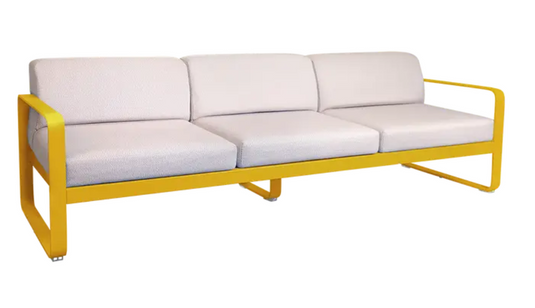 Fermob Bellevie 3-seater outdoor sofa with smooth honey pearl metal frame, stylish outdoor furniture for patio or garden.