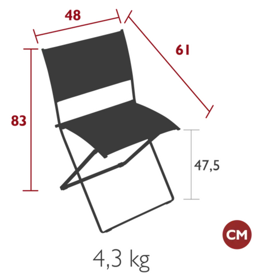 Fermob Plein Air folding armchair with wooden armrests and metal frame, shown in a relaxed outdoor setting.