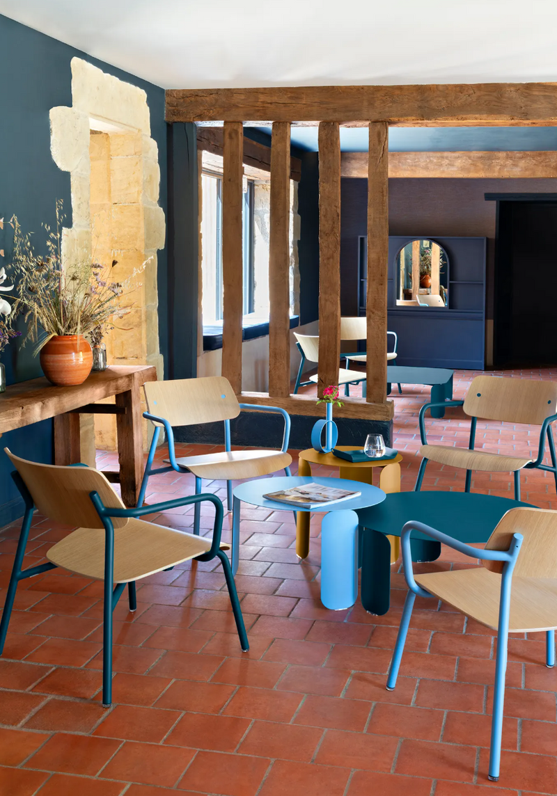 Load image into Gallery viewer, Stackable Fermob Studie Oak Lounge Armchair with metal frame, featuring wooden armrests, suitable for modern office or lounge spaces.
