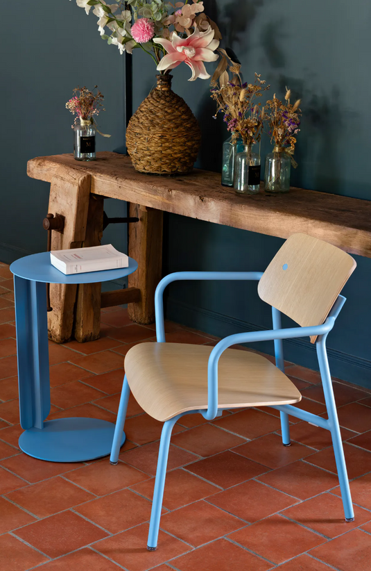 Stackable Fermob Studie Oak Lounge Armchair with metal frame, showcasing a stylish, modern office furniture design.