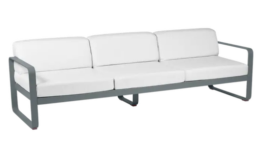 Storm grey and off-white Fermob Bellevie 3-seater outdoor sofa with metal frame, stylish and comfortable for outdoor living.