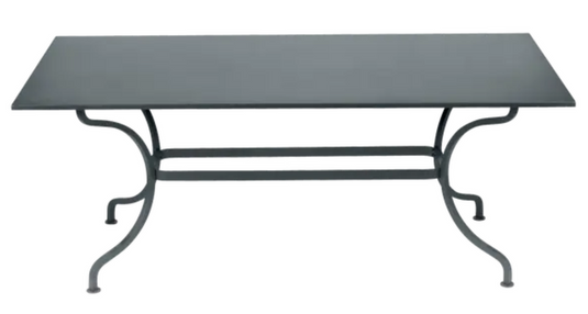 Storm grey Fermob Romane table measuring 180x100 cm, suitable for up to 8 guests, outdoor dining furniture.