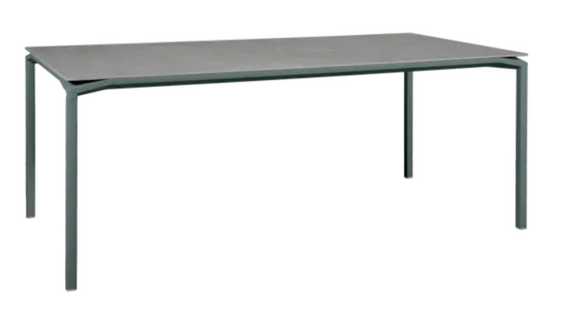 Load image into Gallery viewer, Fermob CALVI Kreta mineral dining table in Storm Grey, 195 x 95 cm, eight-seater with a durable tabletop and modern design.

