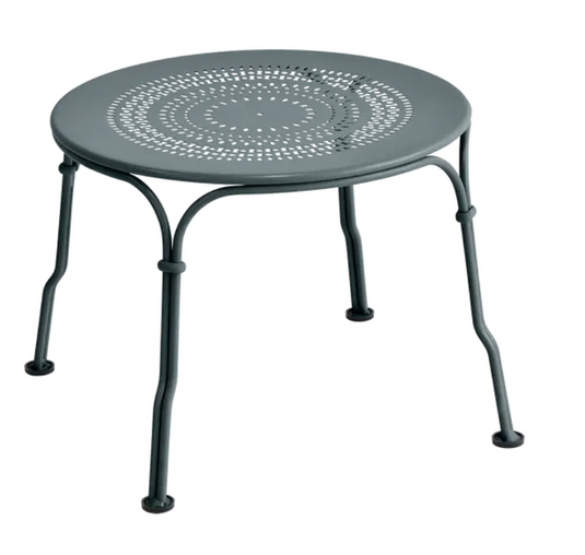 Fermob 1900 low metal table with a 45 cm diameter, featuring a sleek circular design in storm gray finish.