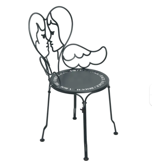 Storm grey Fermob ANGE metal chair with a sleek, modern design, ideal for outdoor furniture settings.