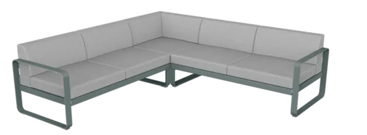Storm grey Fermob Bellevie Composition 2 outdoor sofa set with plush grey cushions, perfect for stylish outdoor lounging.