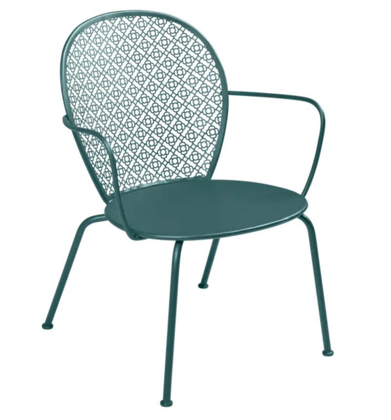 Load image into Gallery viewer, Storm grey Fermob LORETTE low metal armchair with a sleek, modern design suitable for outdoor seating.
