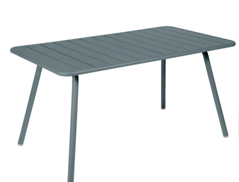 Load image into Gallery viewer, Storm grey Fermob Luxembourg outdoor bar table, 143x80 cm, with sleek design suitable for patio or outdoor dining areas.
