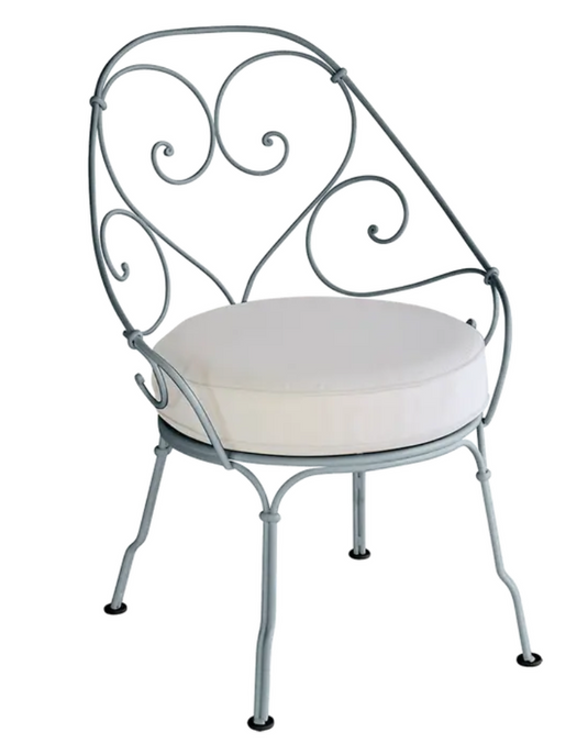 Storm grey Fermob Cabriolet outdoor armchair with off-white cushions, metal frame, stylish and comfortable for outdoor seating.