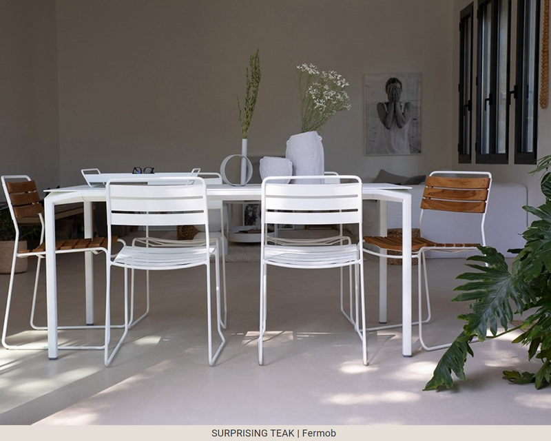 Load image into Gallery viewer, Fermob outdoor metal chair with a surprising teak seat, designed for stylish outdoor furniture.
