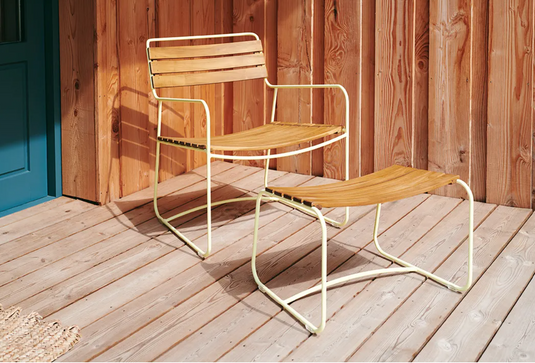 Fermob Surprising Teak Footrest with sleek wooden design, ideal for outdoor or indoor relaxation and comfort.