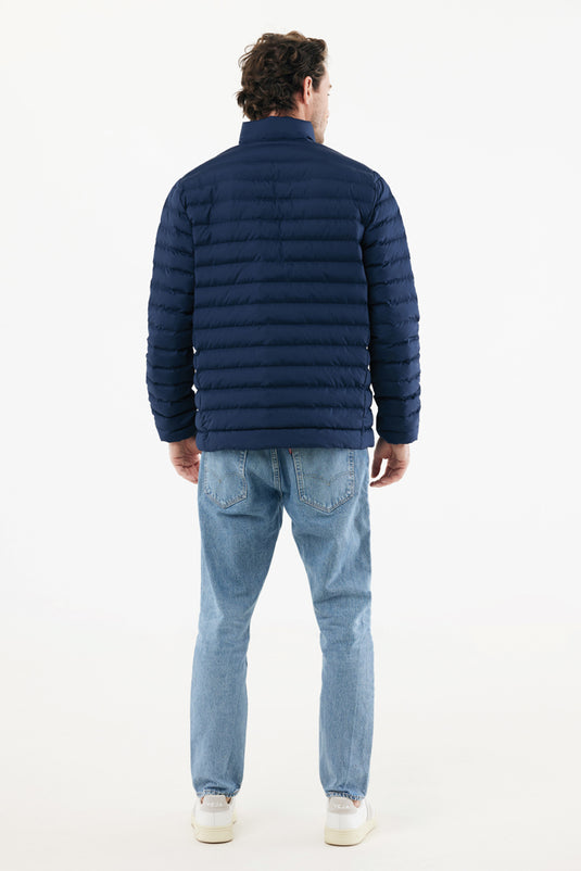 Men's IQONIQ Maiko recycled polyester padded jacket, shown in a close-up of the textile with quilted design and branding details.