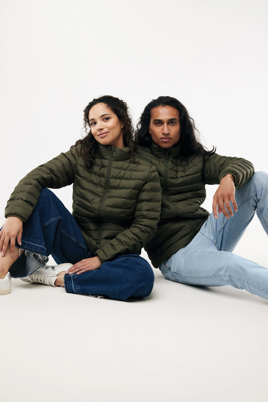 IQONIQ Maiko men's recycled polyester padded jacket displaying a sleek design with a high collar and quilted padding.