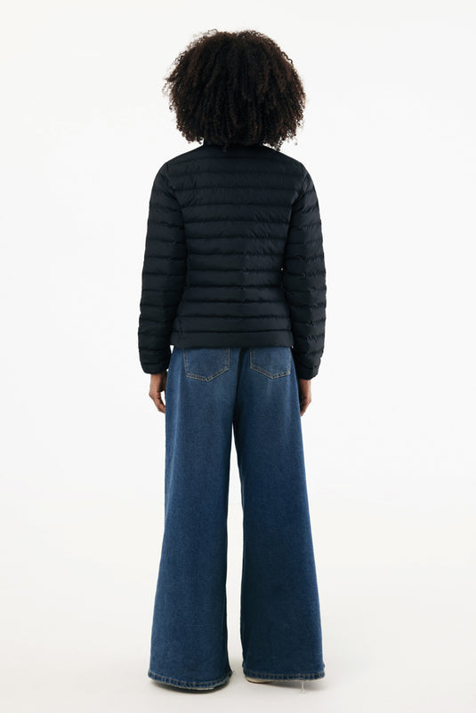 Maiko women recycled polyester padded jacket by iqoniq, showcasing the textile's quilted design and eco-friendly padded construction.