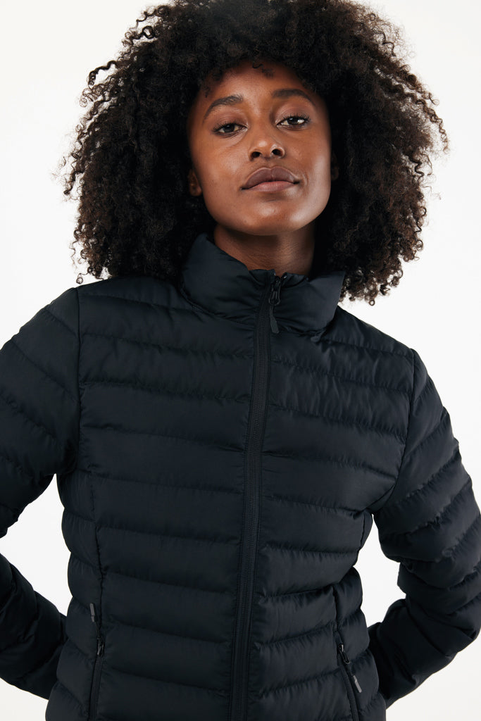 Load image into Gallery viewer, Maiko women recycled polyester padded jacket by iqoniq, shown in olive green with a quilted design and front zipper.

