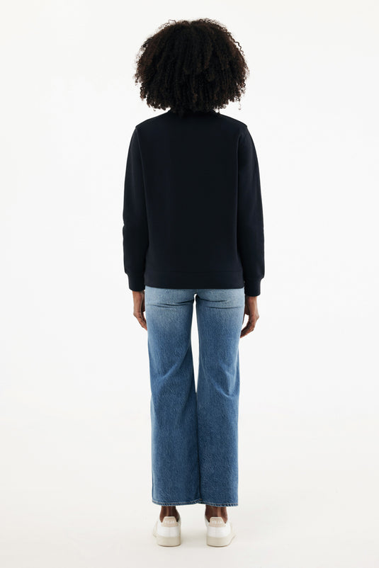 Iqoniq Elgon recycled cotton quarter zip sweater, close-up of the textile fabric and quarter zip detail.
