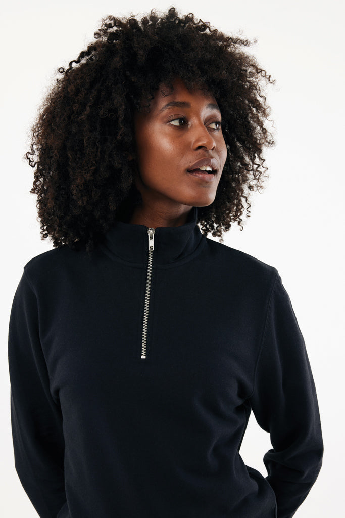 Load image into Gallery viewer, Iqoniq Elgon recycled cotton quarter zip sweater, close-up of the eco-friendly textile with a quarter zipper and textured fabric.
