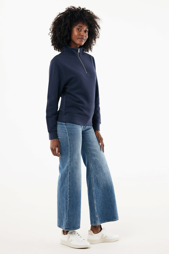 Load image into Gallery viewer, Iqoniq Elgon recycled cotton quarter zip sweater, close-up of the textile featuring the quarter zip and soft fabric texture.
