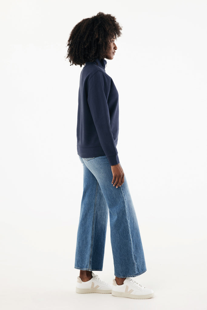 Load image into Gallery viewer, Iqoniq Elgon recycled cotton quarter zip sweater, close-up of the textile showing soft fabric and quarter zip detail.
