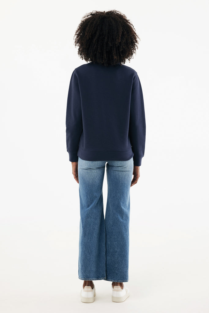 Load image into Gallery viewer, Iqoniq Elgon recycled cotton quarter zip sweater, close-up showing soft fabric, quarter zip detail, and casual style.
