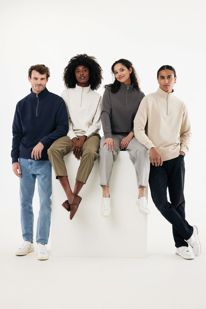 Load image into Gallery viewer, Iqoniq Elgon recycled cotton quarter zip sweater, close-up of the green textile with zipper detail and soft fabric texture.
