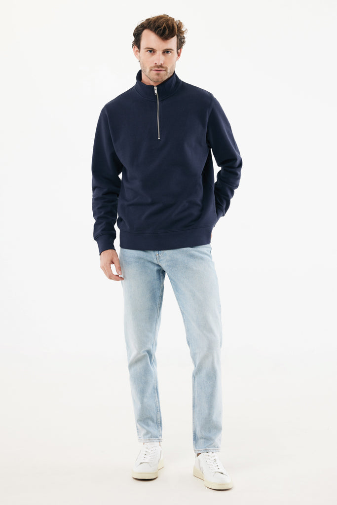 Load image into Gallery viewer, Iqoniq Elgon recycled cotton quarter zip sweater, close-up showing green textile fabric and quarter zip detail.

