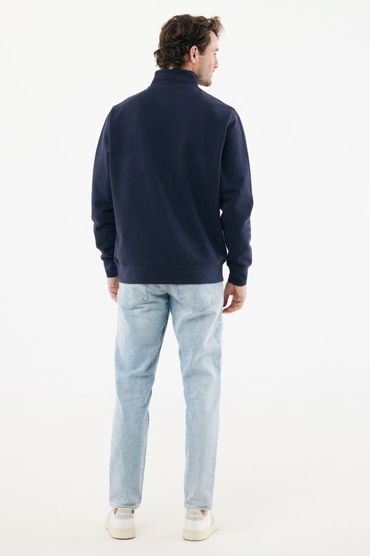 Iqoniq Elgon recycled cotton quarter zip sweater, close-up of the textured textile fabric and quarter zipper detail.