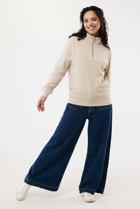 Iqoniq Elgon recycled cotton quarter zip sweater, textile product with a high collar and quarter-length zipper, in natural fabric.