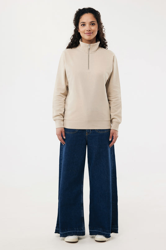 Iqoniq Elgon recycled cotton quarter zip sweater, close-up of the textile fabric featuring a quarter zipper and textured knit design.