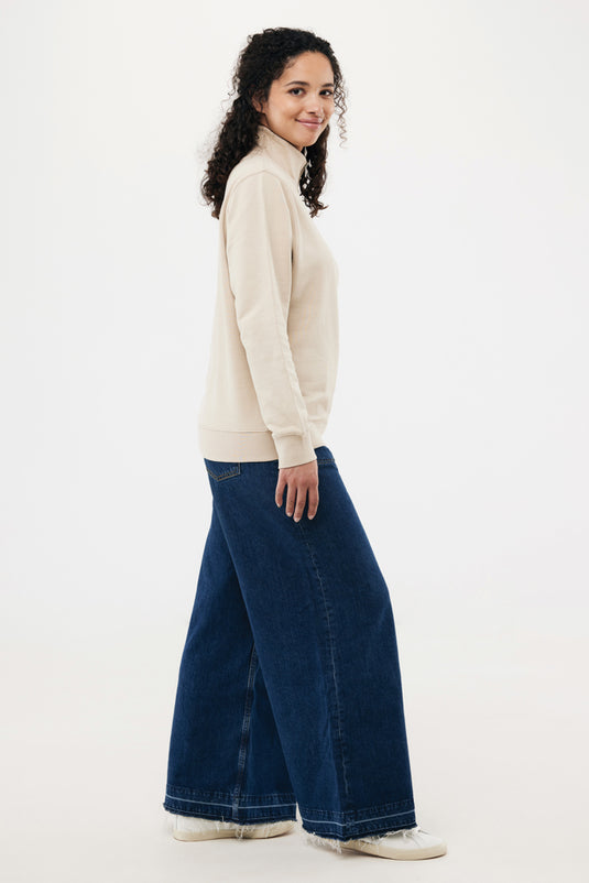 Iqoniq Elgon recycled cotton quarter zip sweater, close-up of the textile fabric showing the quarter zip detail and soft knit texture.